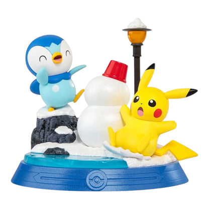 RichRevived Pokémon Pikachu and Piplup winter scene figure with a snowman and lamp post on a blue display base.